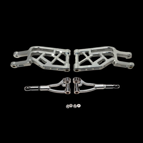 Set of metal suspension components on a black background