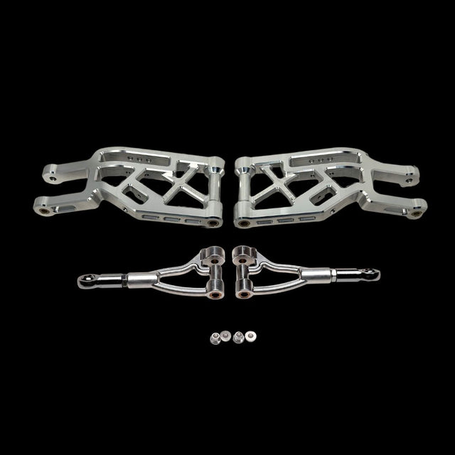 Set of metal suspension components on a black background