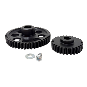 Two black gears and two small metal washers on a white background