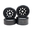 Four black wheels with plastic rim on a white background