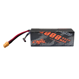 Black battery pack with red and yellow connectors on a white background