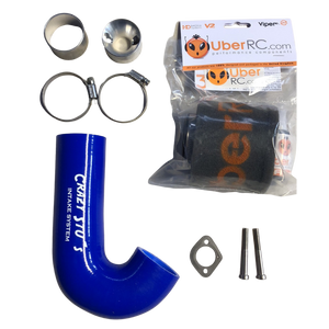 Collection of automotive parts including a blue intake system, metal clamps, and a package labeled 'Uber RC' on a white background.