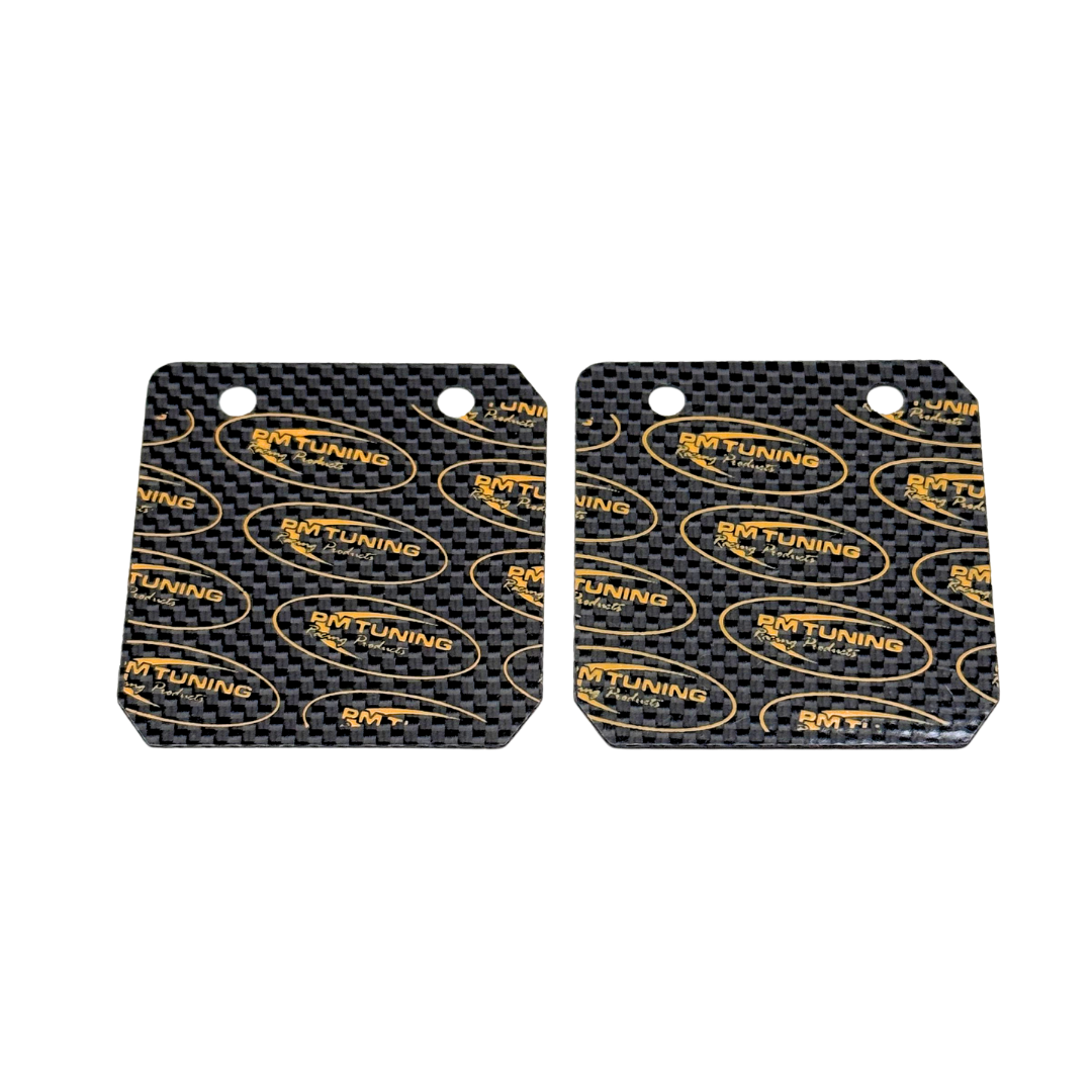 Two carbon fiber patterned car mats with 'RMT Tuning' branding on a white background.