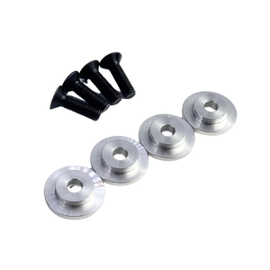 Set of four silver metal washers and three black screws on a white background