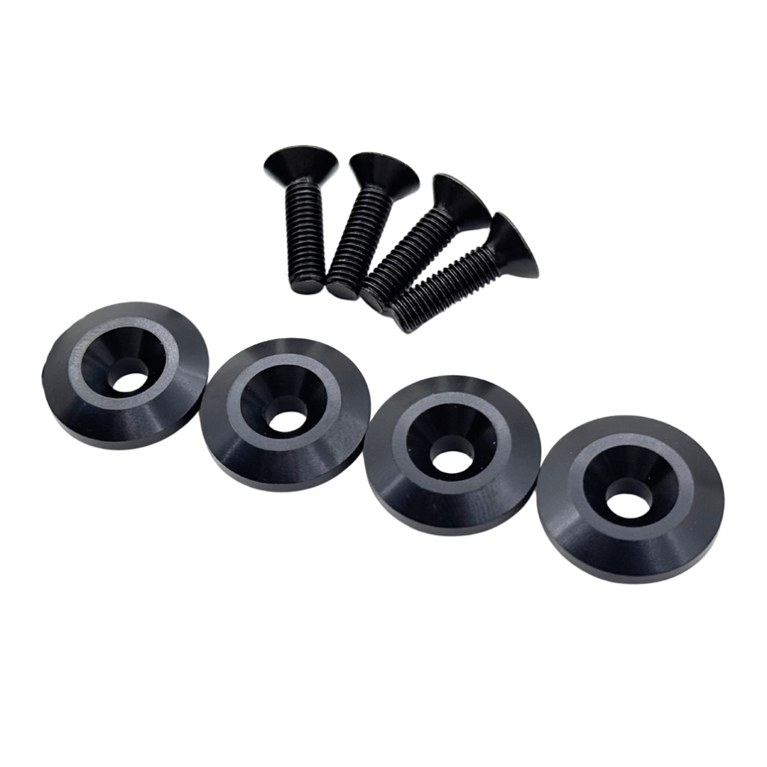 Set of black screws and washers on a white background