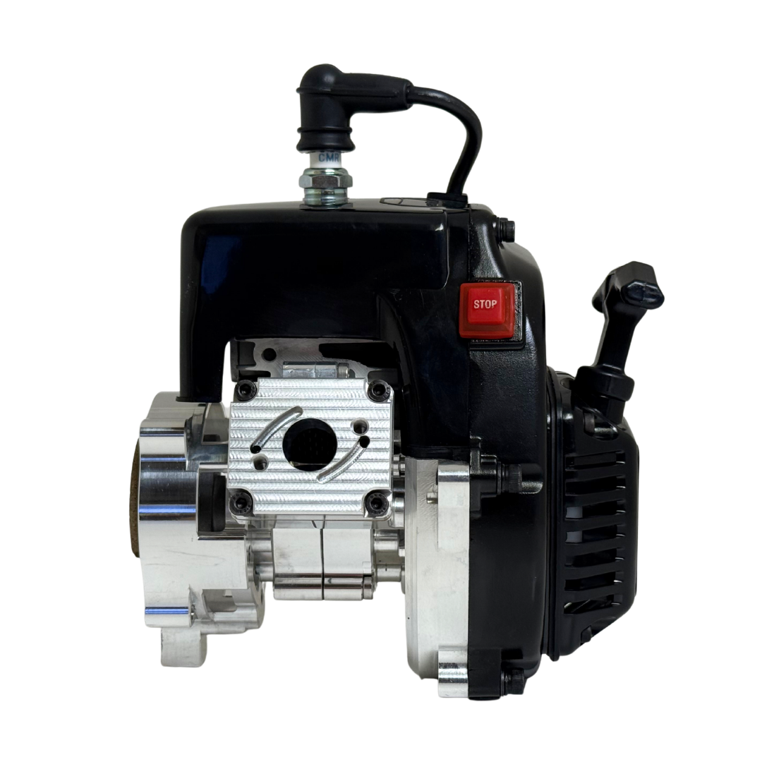 HPRC billet reed case 32cc race ported Zenoah engine, side view showing the raw silver reed case, black cylinder head, pull-start handle and red stop switch