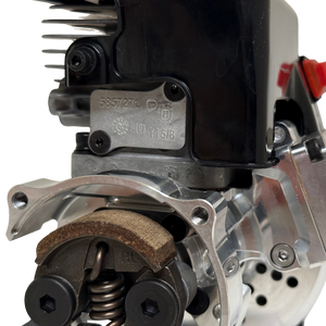 Close-up of the HPRC 34cc race ported Zenoah engine's raw silver clutch mechanism, showing the clutch shoe, spring and mounting hardware in detail