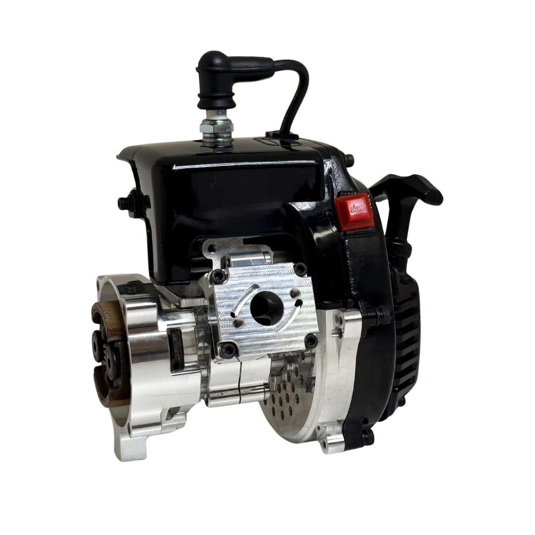 Side view of the HPRC 38cc race ported Fujiwara engine from the opposite angle, showing the raw silver reed case, clutch bell and red stop switch