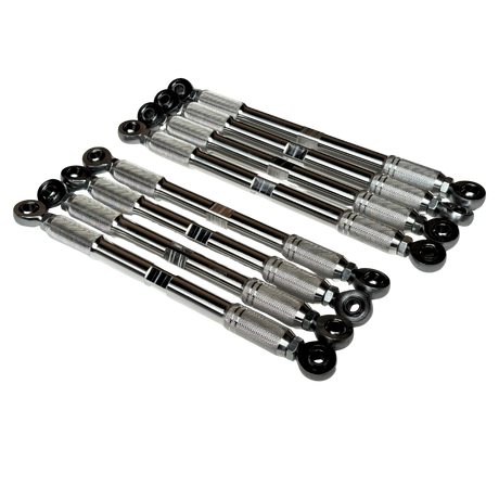 Eight automotive tie rod ends with knurled silver metal centers and black spherical caps, arranged in two parallel rows on a plain white background.