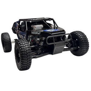 Black off-road model vehicle with large tires on a white background