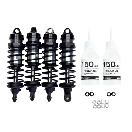 Four shock absorbers and two bottles of shock oil on a white background