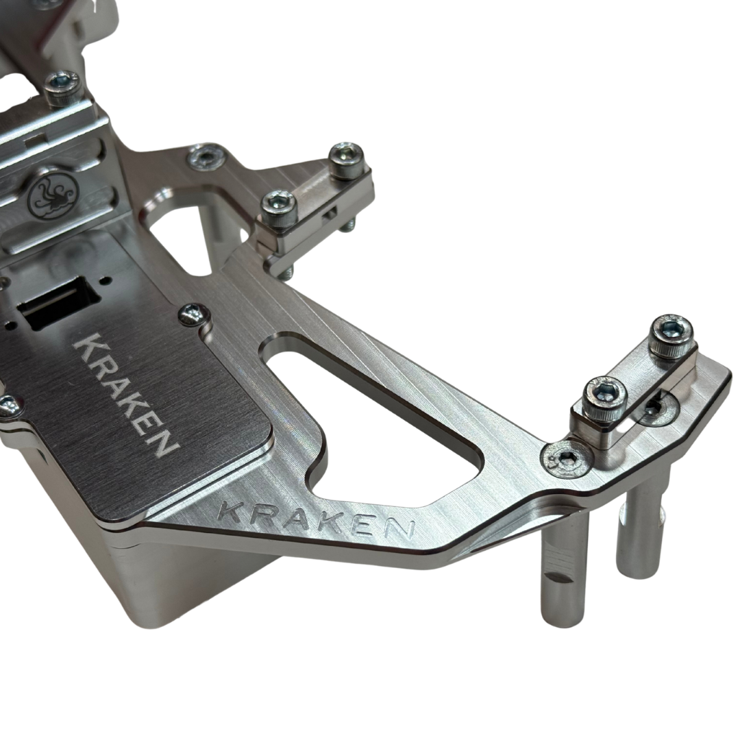 Metallic component with 'Kraken' branding on a white background