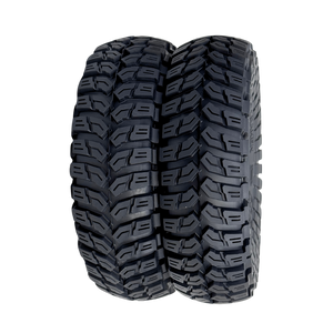 Tire with prominent tread pattern on a white background