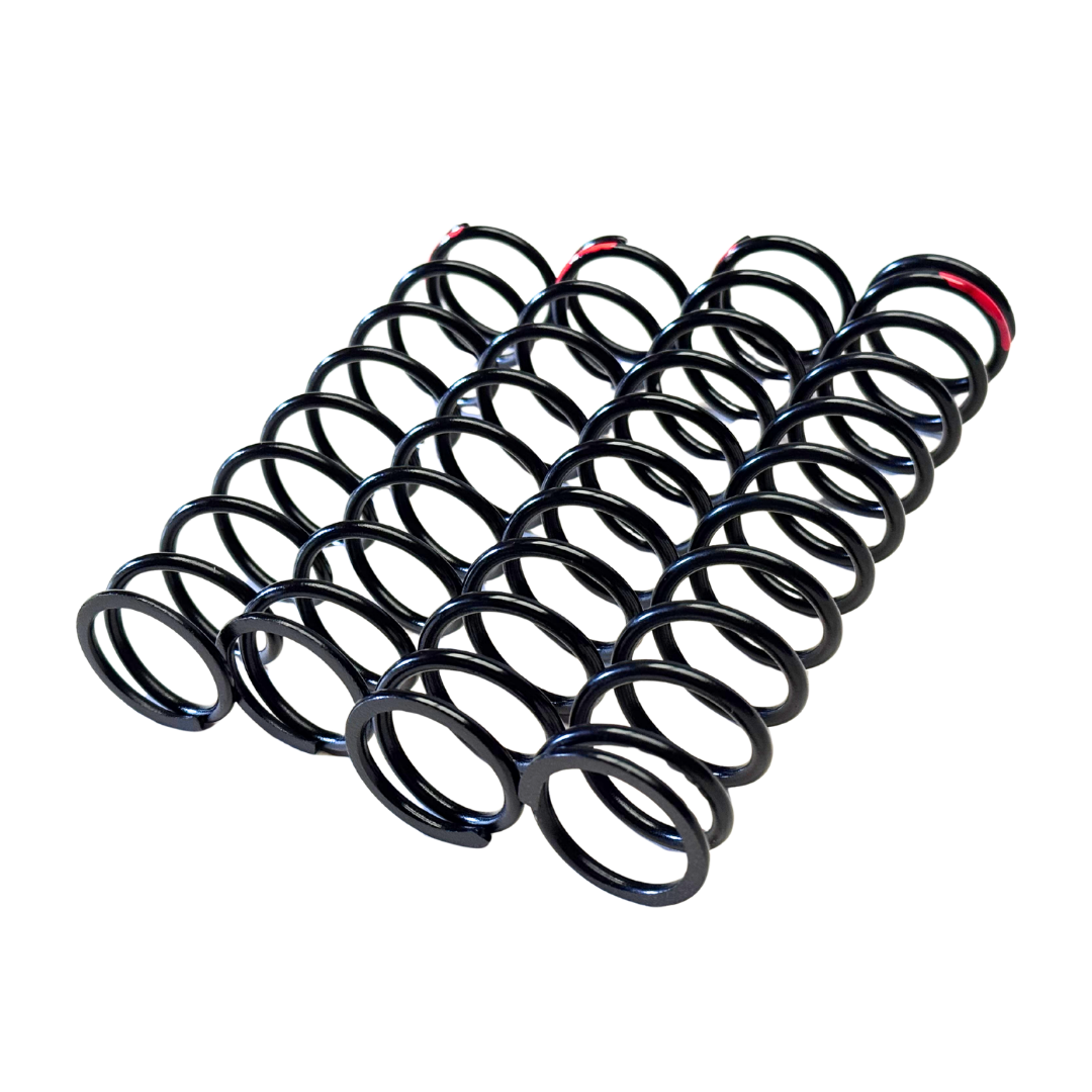 Set of black metal springs on a white background