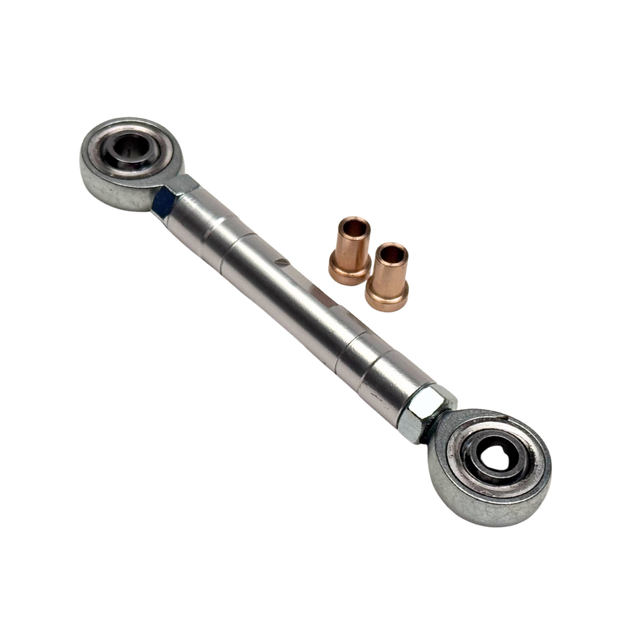 Metal rod with bearings and small copper components on a white background