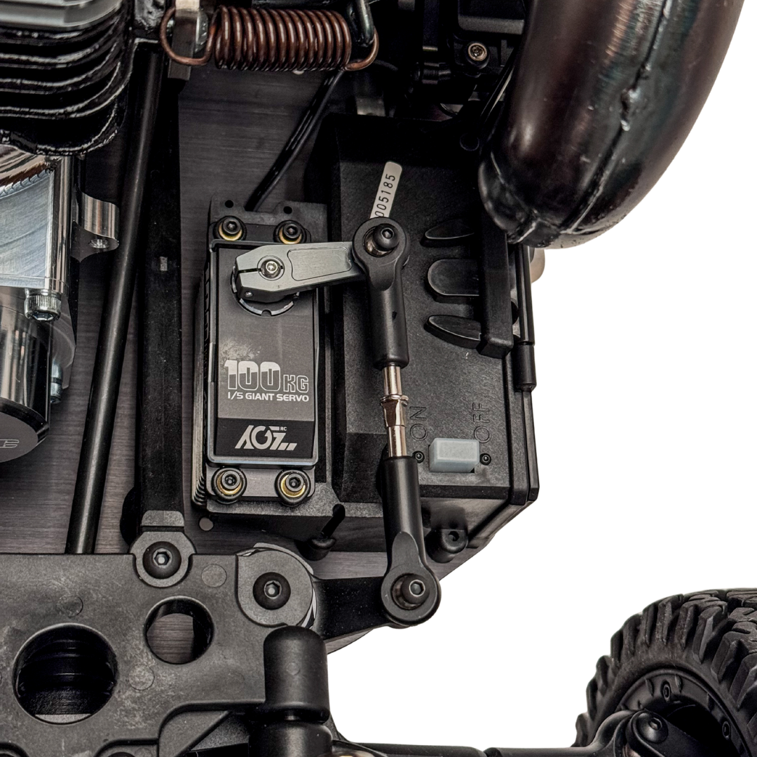 Close-up of a mechanical component with a brand label on a white background