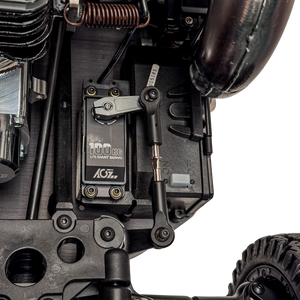 Close-up of a mechanical component with a brand label on a white background