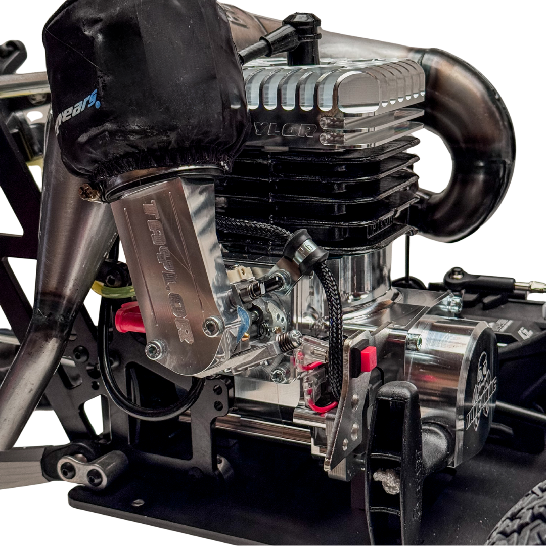 Close-up of a mechanical engine with visible branding on a white background