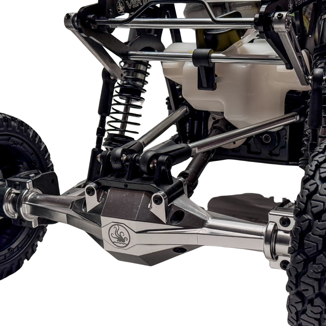 Close-up of a mechanical vehicle suspension system on a white background