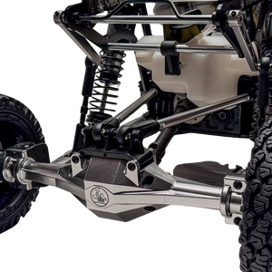 Close-up of a mechanical vehicle suspension system on a white background