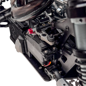 Close-up of a mechanical engine or motor assembly on a white background