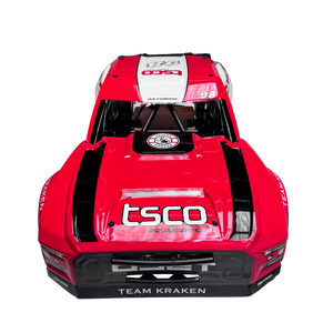 Red and black model car with 'tsco' and 'Team Kraken' branding on a white background