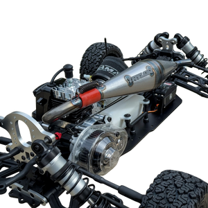 Close-up of a detailed RC car chassis with suspension and engine components on a white background