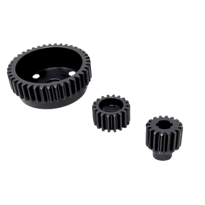Three black metal gears of different sizes on a white background
