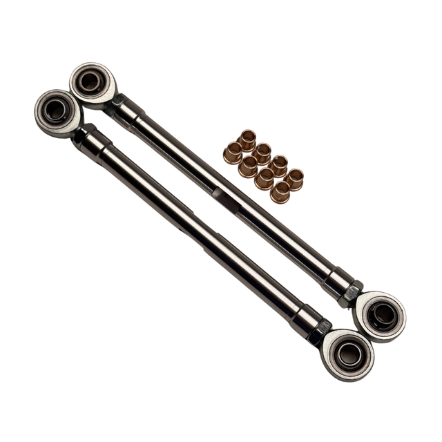 Set of metal control arms with bushings on a white background