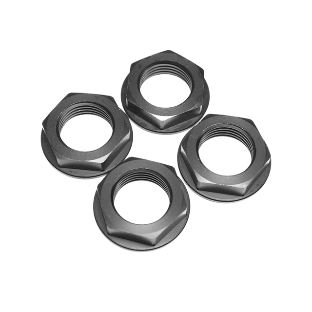 Four black hex nuts on a white background