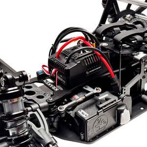Close-up of a mechanical model with wiring and components on a white background