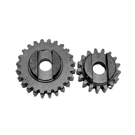 Two metal gears on a white background