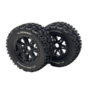 Two black off-road tires with visible branding on a white background