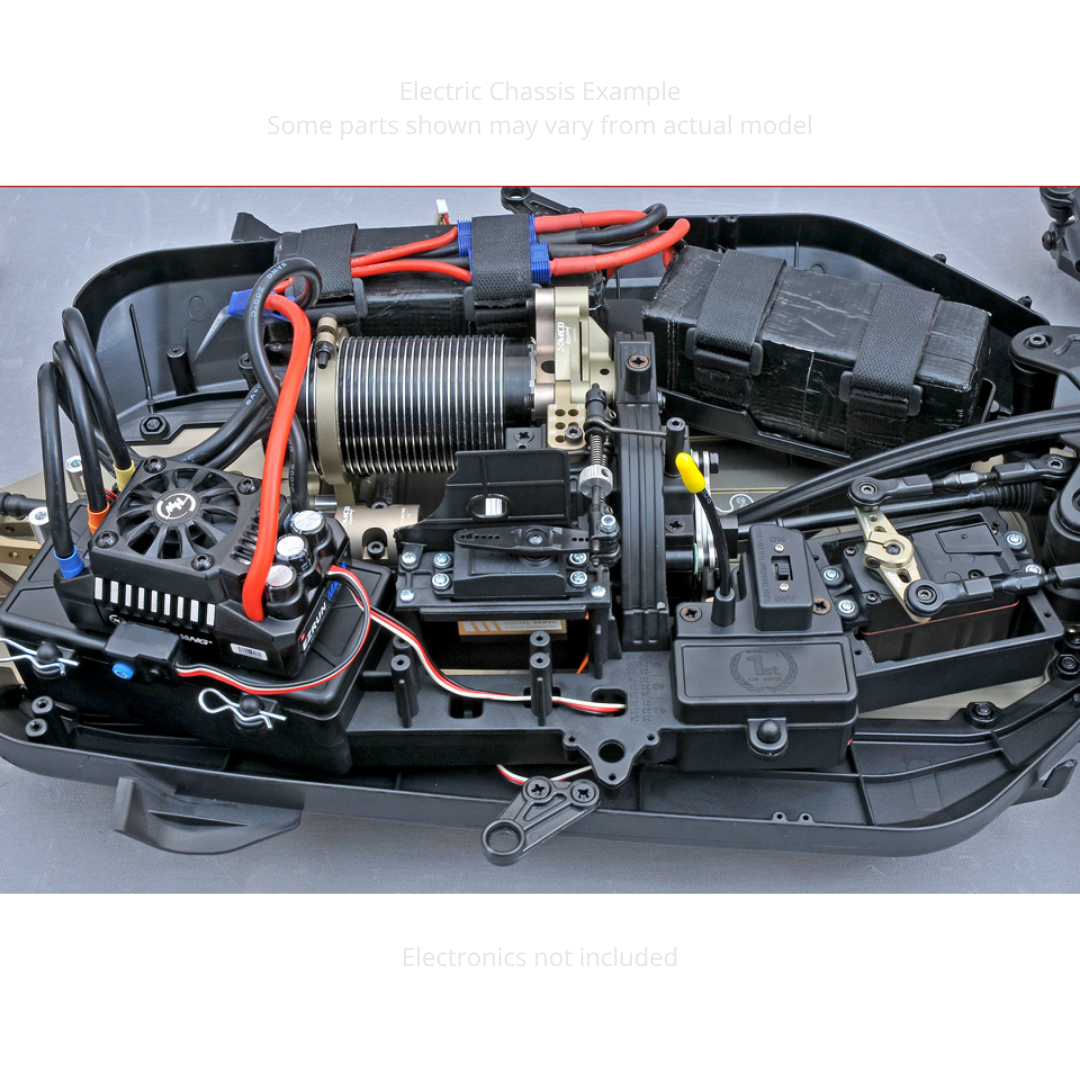 Close-up of a mechanical model with intricate components and wiring on a gray background.