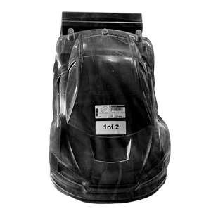 Black toy car in clear packaging on a white background