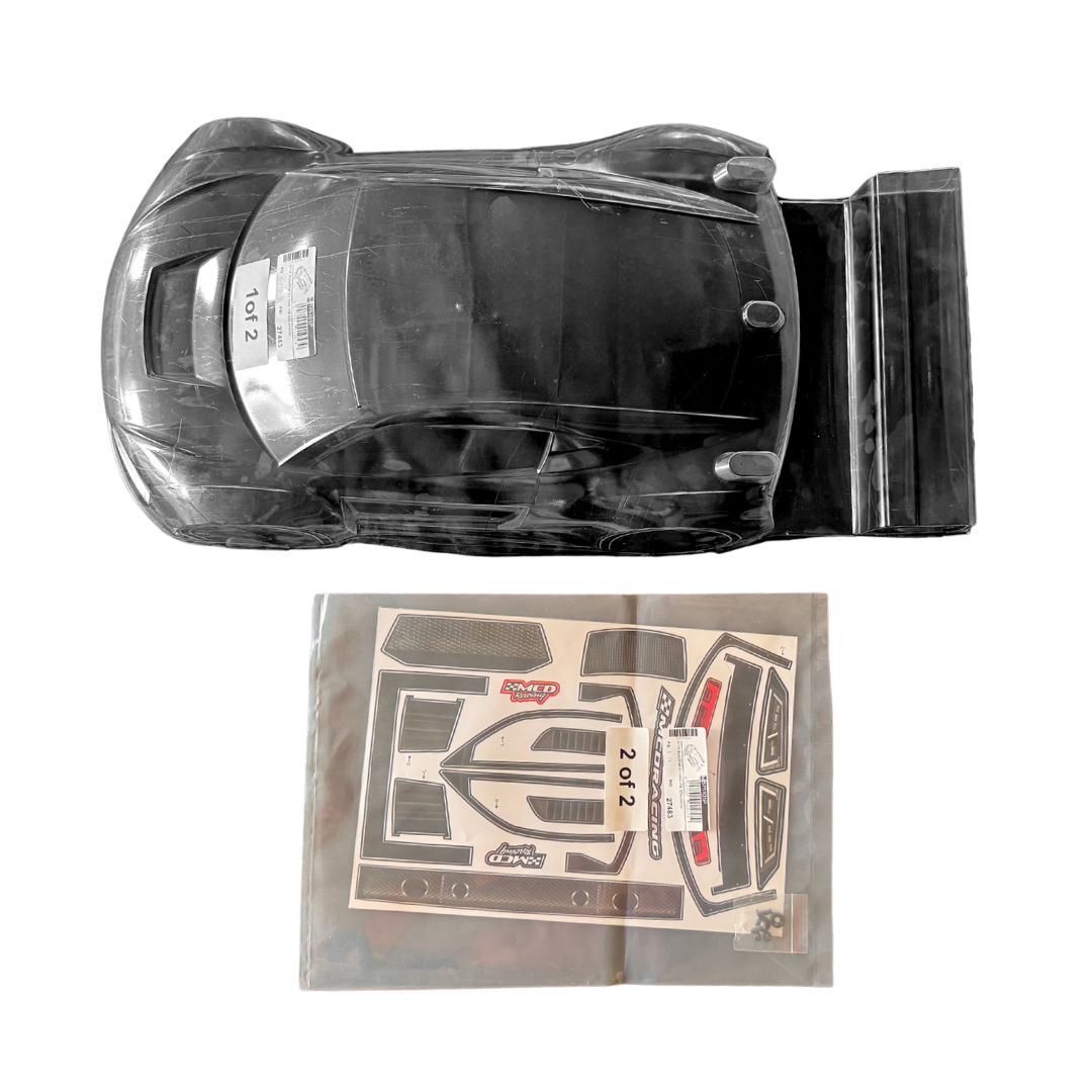 Clear plastic car model with a set of decals on a white background