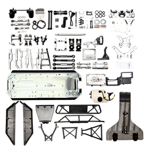 Full contents of the Outlaw V4 Billet Hybrid Slider kit version laid out including chassis, arms, towers, wheelie bar and hardware
