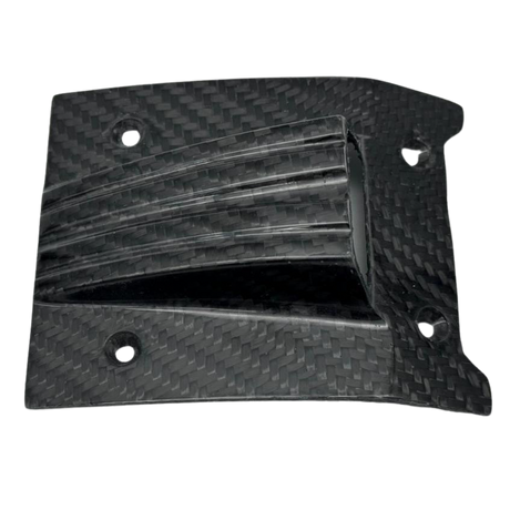 Carbon fiber panel with a textured surface on a white background
