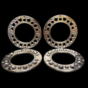 A set of four metal beadlocks designed for 1/5 scale wheels and tyres, displayed on a dark background.