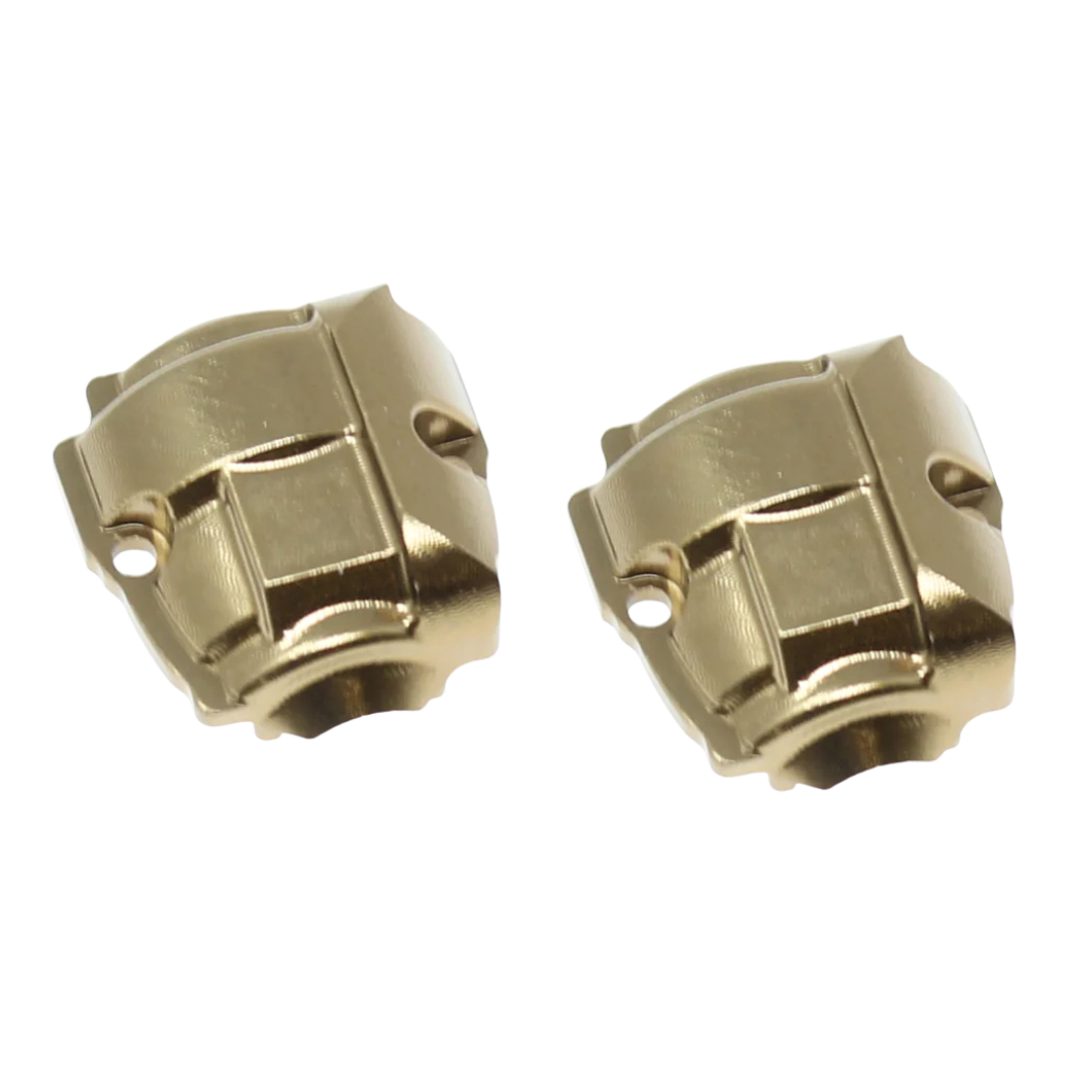 Two gold metal components on a white background