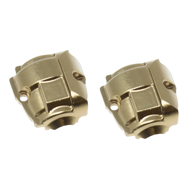 Two gold metal components on a white background