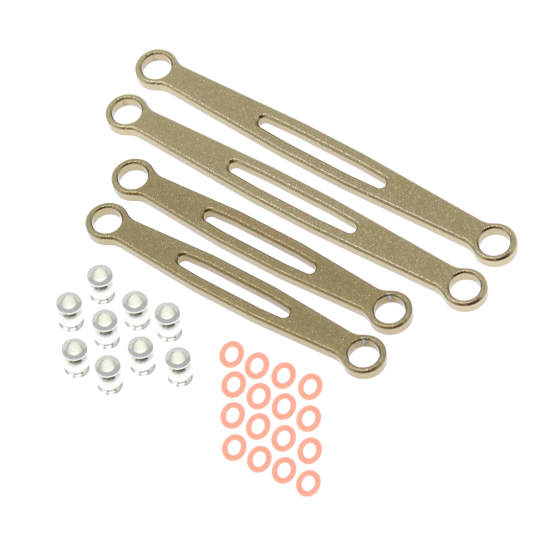 Set of gold metal brackets with small components on a white background