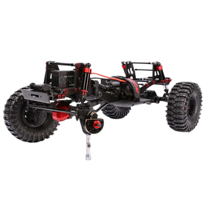 Black and red off-road vehicle chassis on a white background