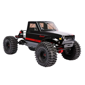Black off-road model truck with large tires on a white background