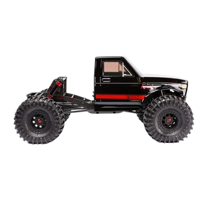 Black off-road toy truck with large wheels on a white background