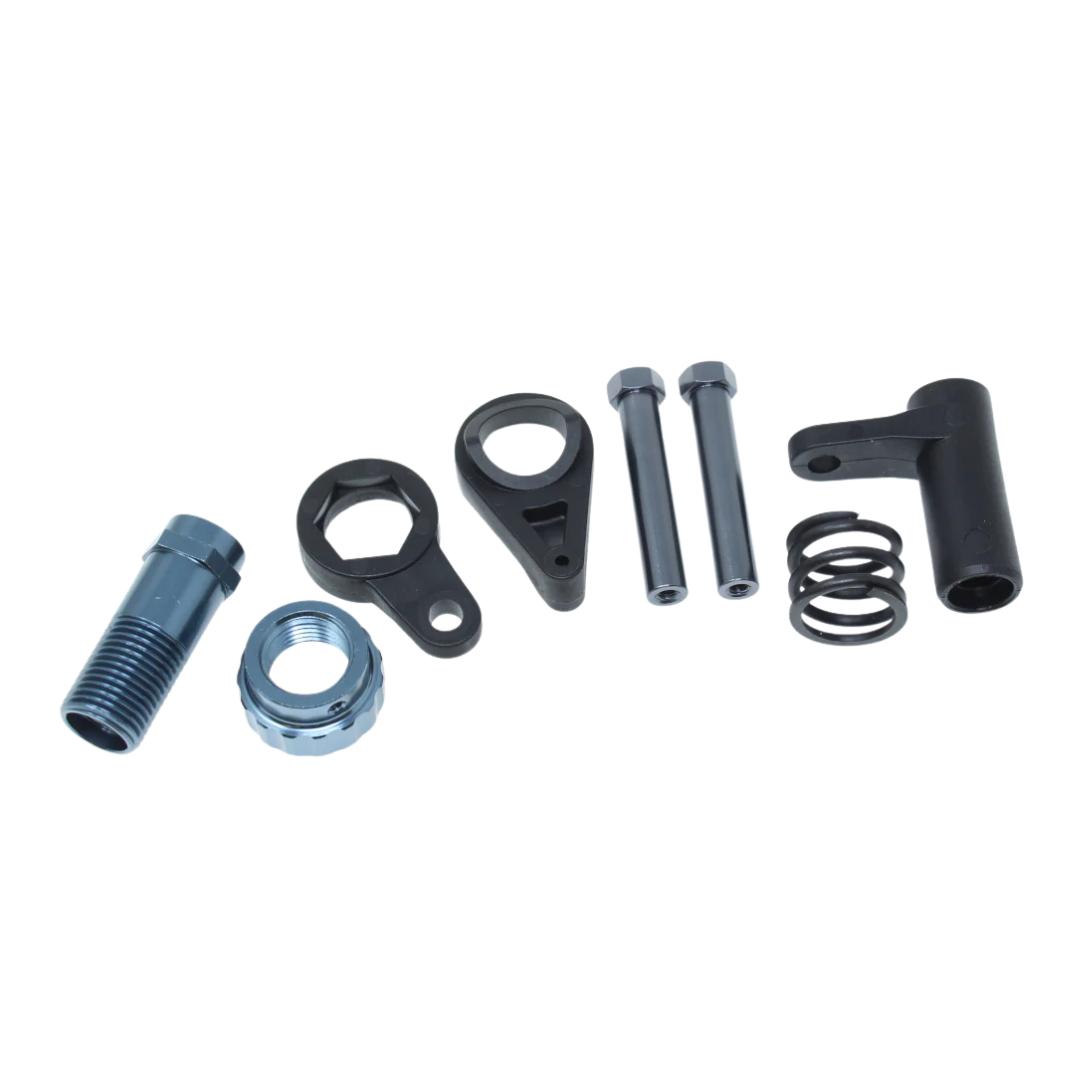Set of mechanical parts including bolts, nuts, and springs on a white background
