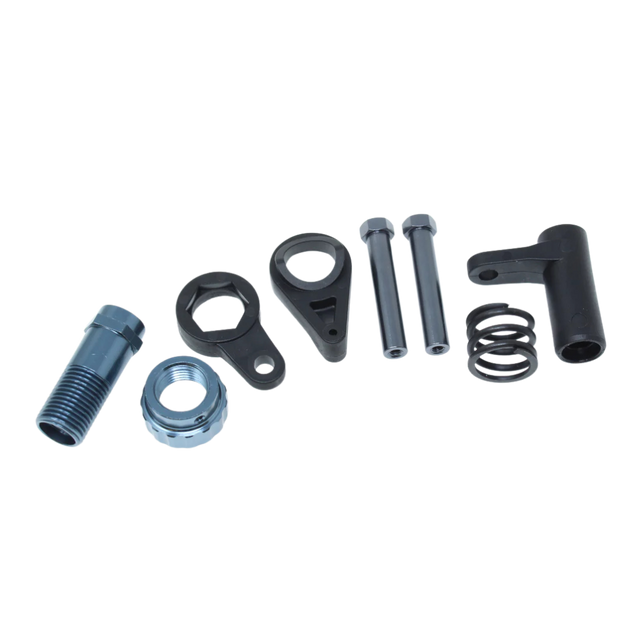 Set of mechanical parts including bolts, nuts, and springs on a white background