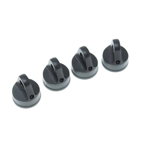 Four black caps on a white background