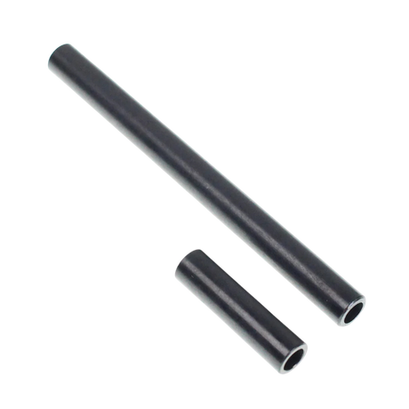 Two black cylindrical objects on a white background
