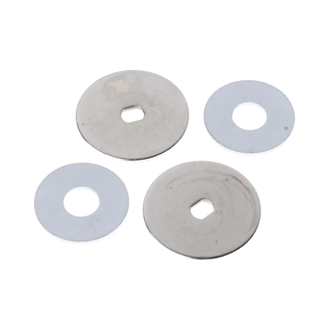 Four circular metal washers on a white background